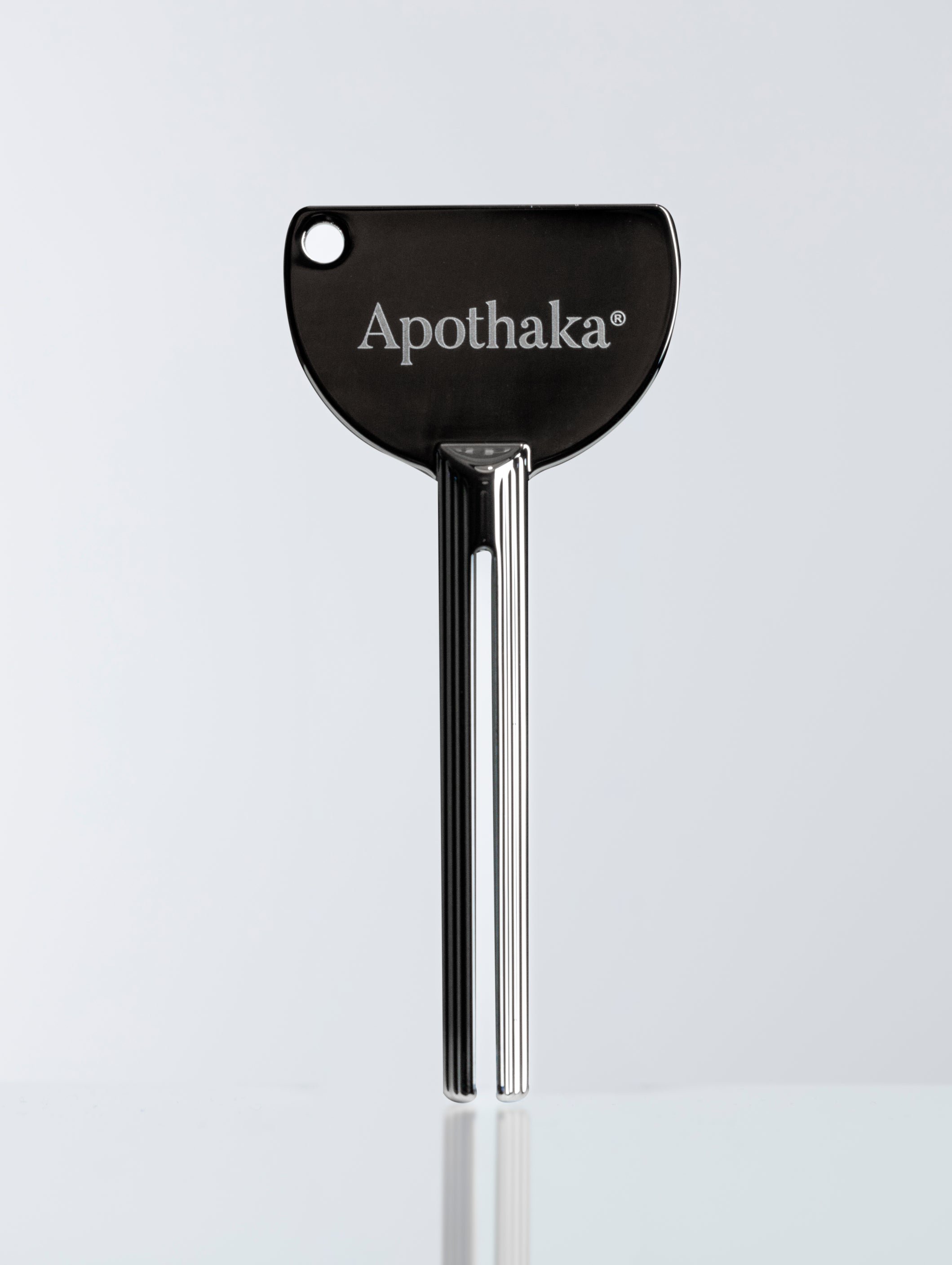Apothaka metal tube squeezer key silver Apothaka Skincare