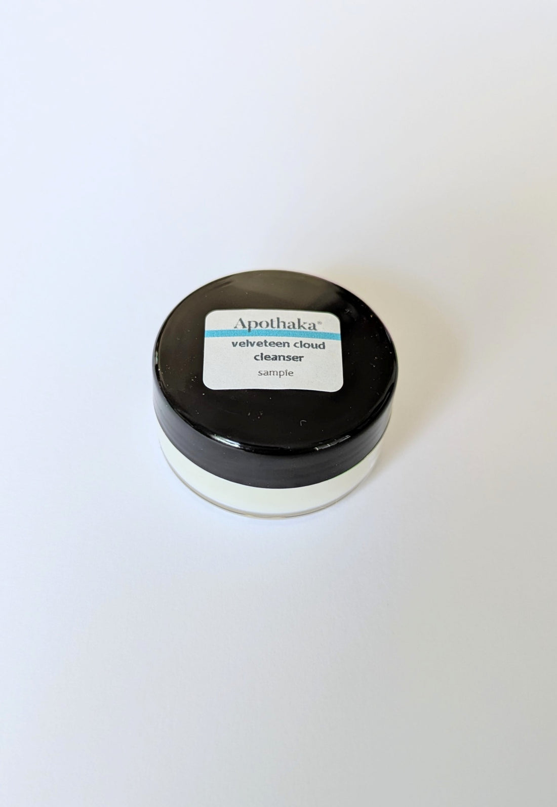 Small container of Apothaka velveteen cloud face mask on a white background