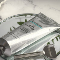 Apothaka gentle cleansing gel 125ml with metal tube squeezer key - close up